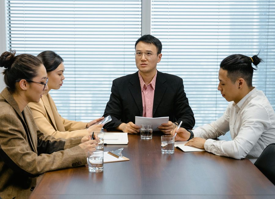 Corporate meeting table with professionals